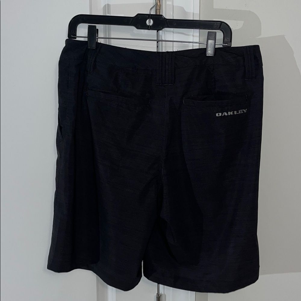Black Oakley flat front Hydrolix 4 pocket golf walking trail 10” shorts 34 M